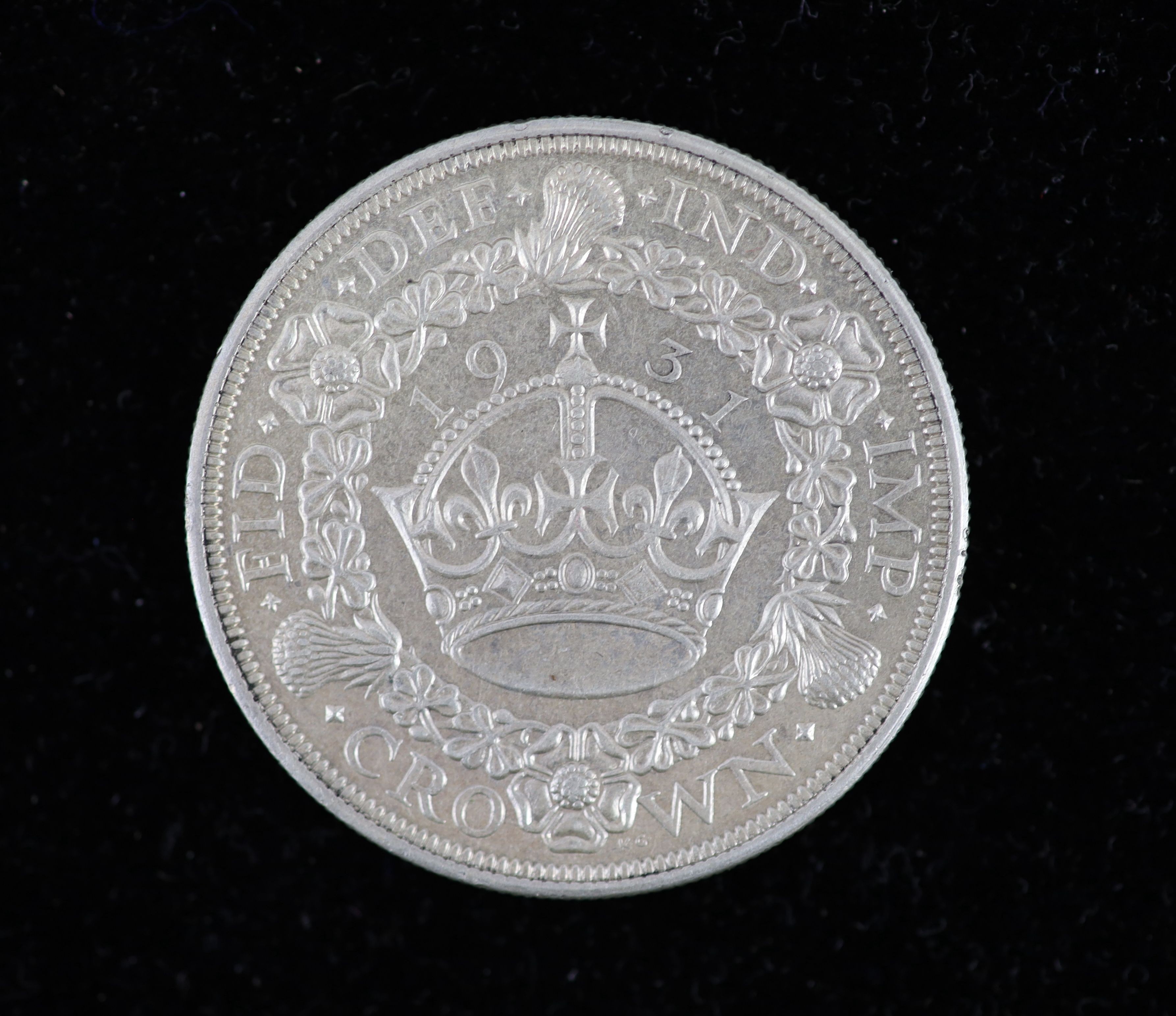 A George V specimen set of nine coins, 1931, fourth coinage, comprising Crown, (S4036), cleaned otherwise about EF, halfcrown and threepence, cleaned otherwise about EF or better, florin, shilling and sixpence, cleaned g